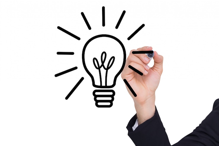 Free Photo elegant man drawing a bulb