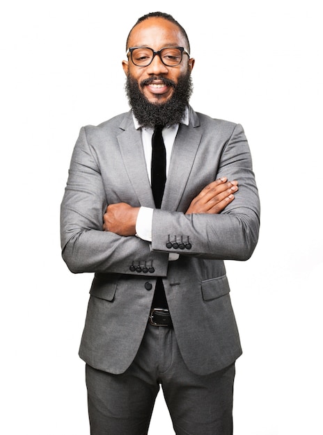 Free photo elegant man in a suit and arms crossed