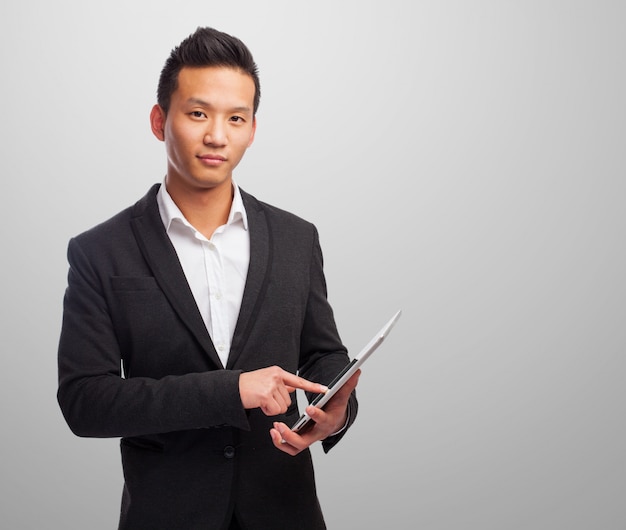 Free Photo elegant man with a tablet