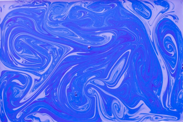 Elegant marbled blue and lavender vector background