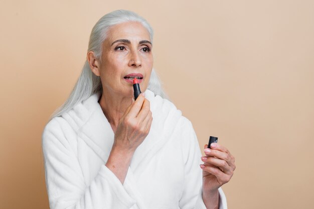 Elegant mature woman with lipstick