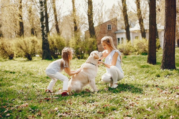 elegant mother with cute daughter 