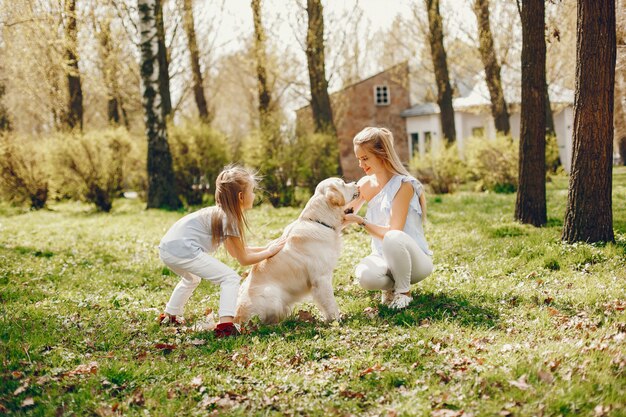 elegant mother with cute daughter 