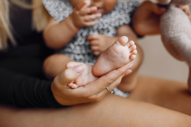 Elegant mother with cute little daughter 