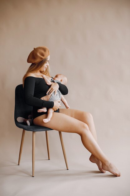 Elegant mother with cute little daughter 