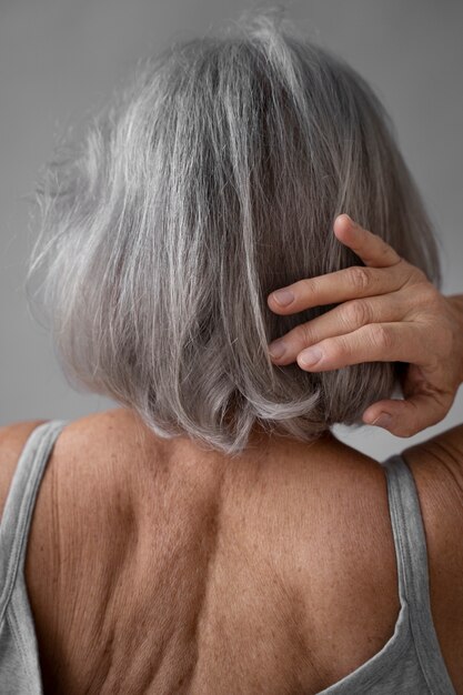 Elegant old woman back portrait