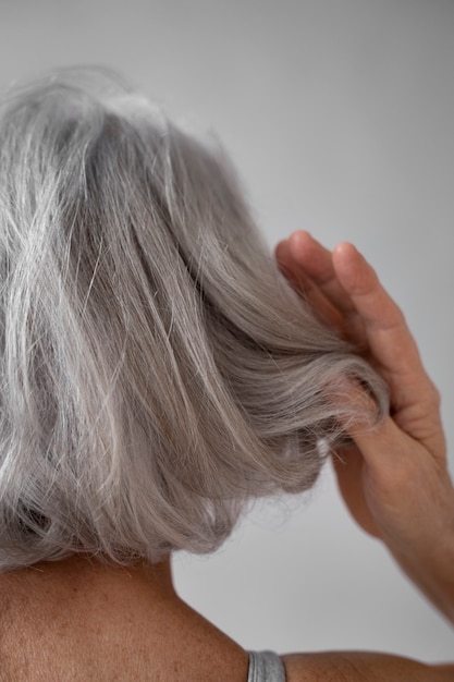 Elegant old woman back portrait