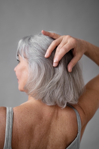 Elegant old woman back portrait