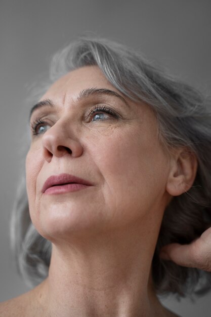 Elegant old woman portrait in casual clothes