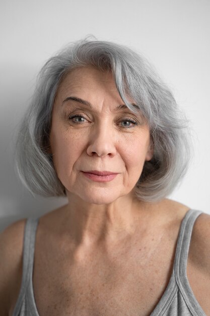 Elegant old woman portrait in casual clothes