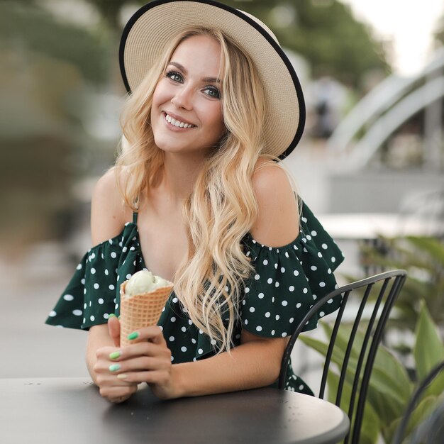 elegant pretty young woman in dress outdoor