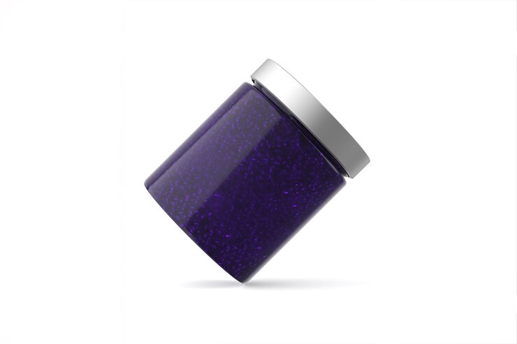 Free Photo elegant purple glitter cosmetic jar with silver lid isolated on white background