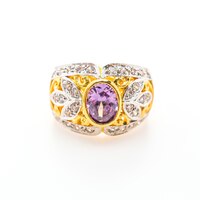 Free photo elegant ring with purple gemstone