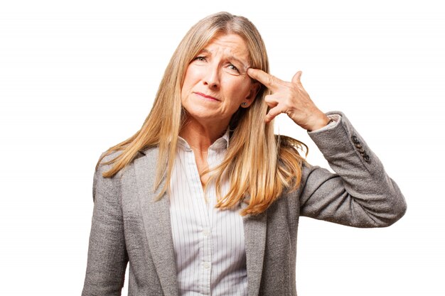 Elegant senior woman shooting her head by the hand