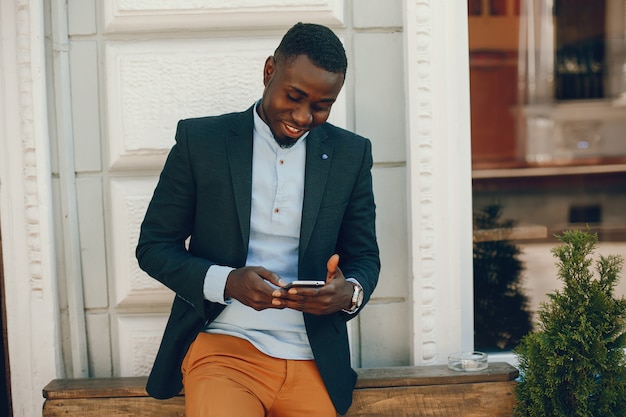 Free Photo | Elegant and stylish black guy in a blue shirt and black ...