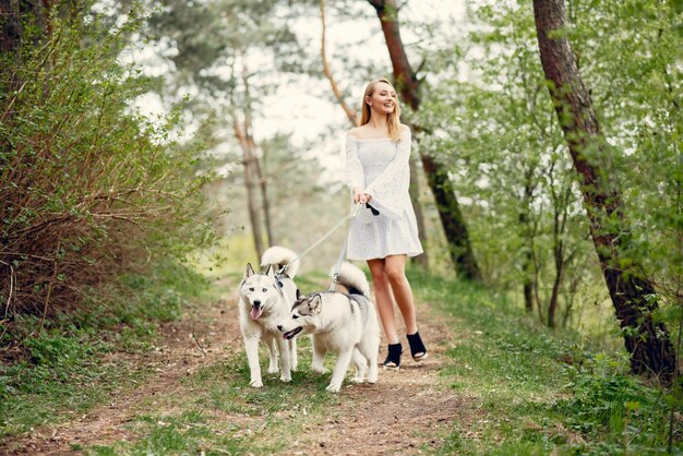 Elegant and stylish girl in a spring park