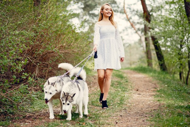 Elegant and stylish girl in a spring park