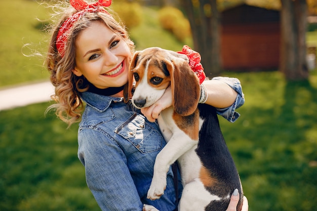 Elegant and stylish girl in a spring park