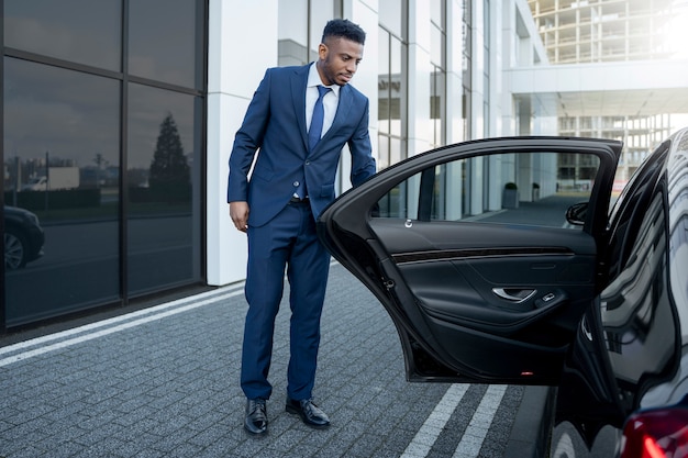 Elegant uber driver giving taxi ride