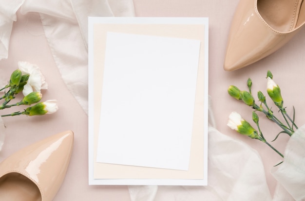 Free photo elegant wedding invitation with high heels