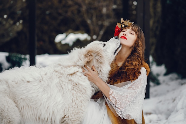 Elegant woman in a long white dress