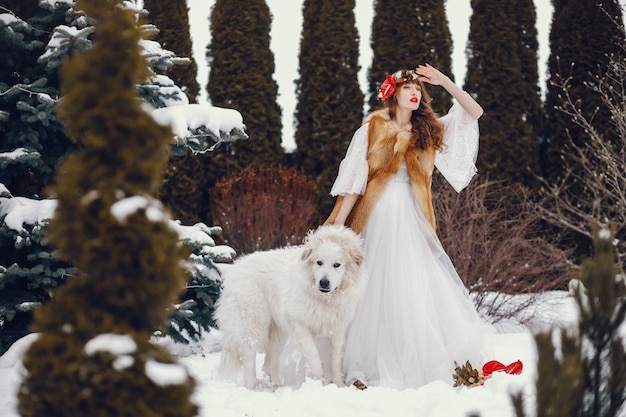 Elegant woman in a long white dress