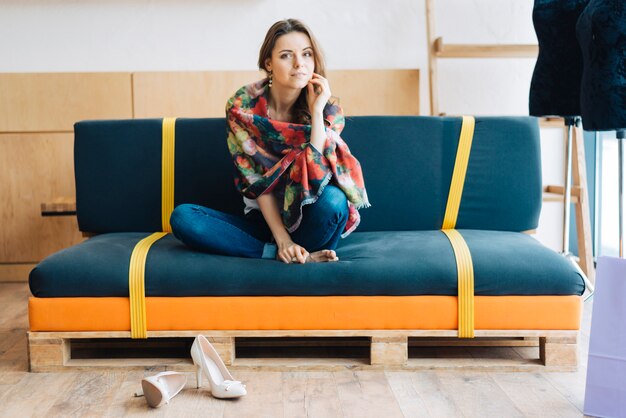 Elegant woman on sofa