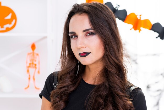 Elegant woman with halloween make-up