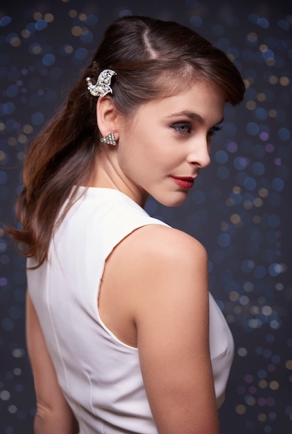 Elegant woman with silver jewelery