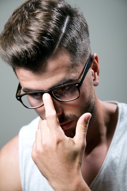 Elegant young handsome man. Studio fashion portrait.