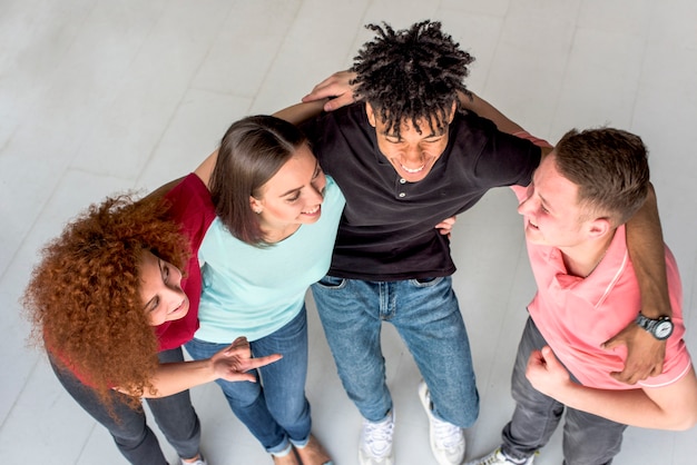 Elevated view of cheerful friends having conversation