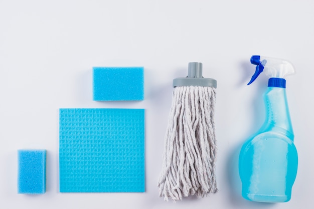 Elevated view of cleaning products on grey background