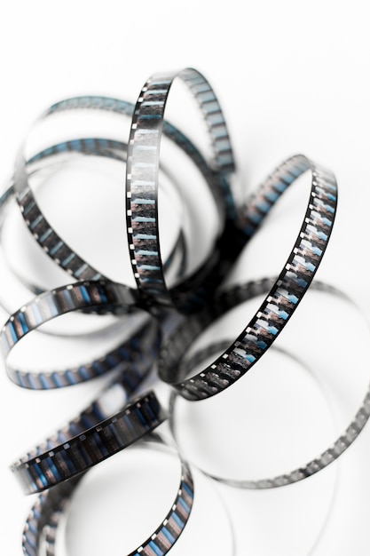 An elevated view of curve film stripe on white background