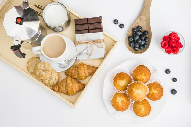 Elevated view of delicious breakfast on white background