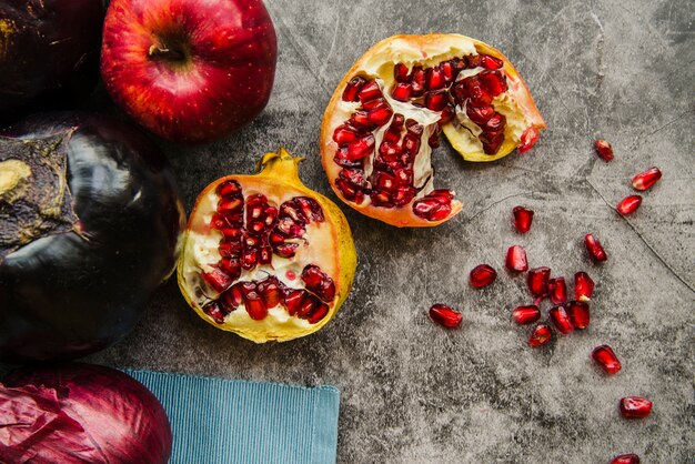 Elevated view of fresh fruits and vegetable on weathered background