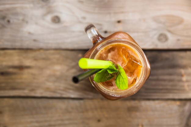 Elevated view of iced tea in mason jar