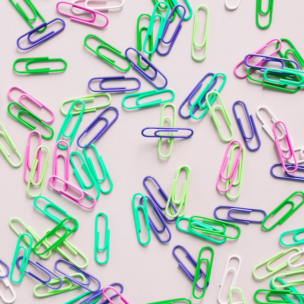 Free photo elevated view of many colorful paper clips