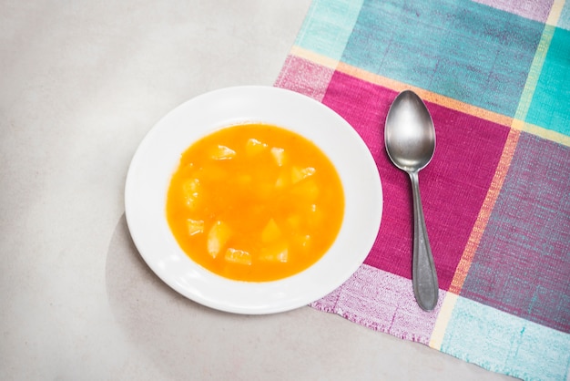 Free photo elevated view of pumpkin puree on plate