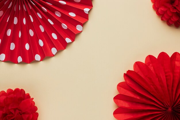 Elevated view of red beautiful origami flower pattern