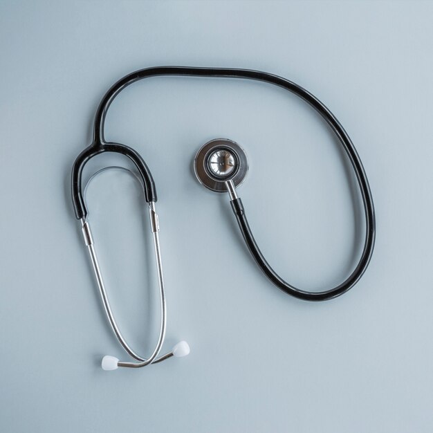 Elevated view of stethoscope over grey background