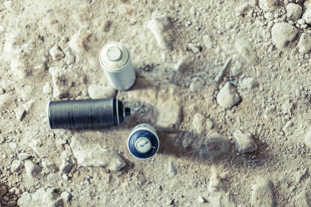 Elevated view of three aerosol cans