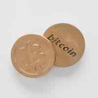 Free photo elevated view of two bitcoins over the white background