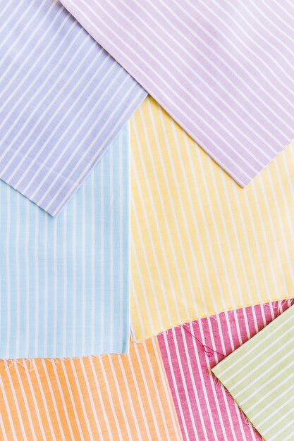 Elevated view of various multi colored stripes pattern clothes