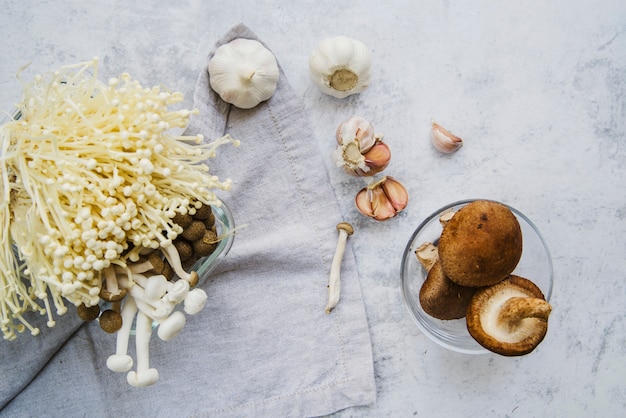 Free photo elevated view of vegetables and napkin on backdrop