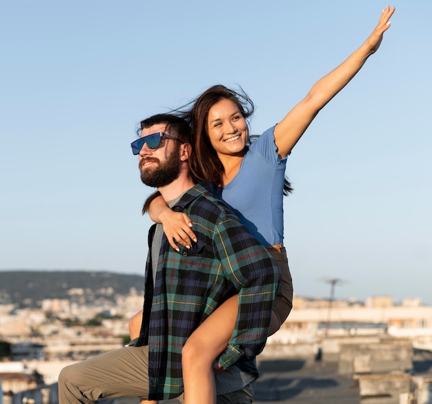 Embraced happy couple outdoors