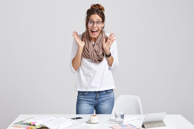 Emotional woman scientist prepares scientific report