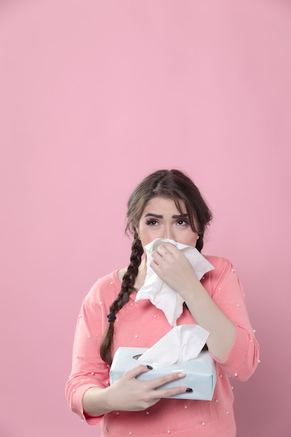 Free photo emotional woman using napkins