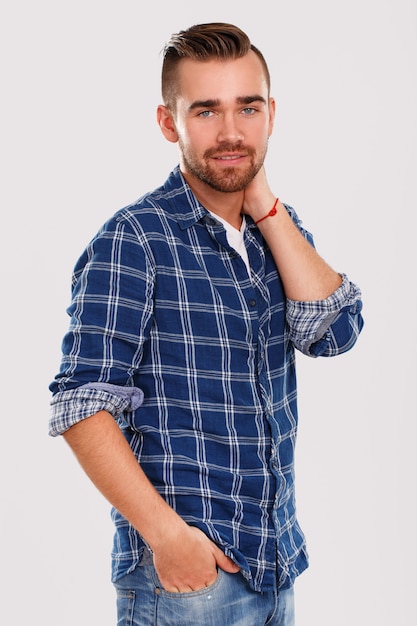 Emotions. Young man in blue shirt