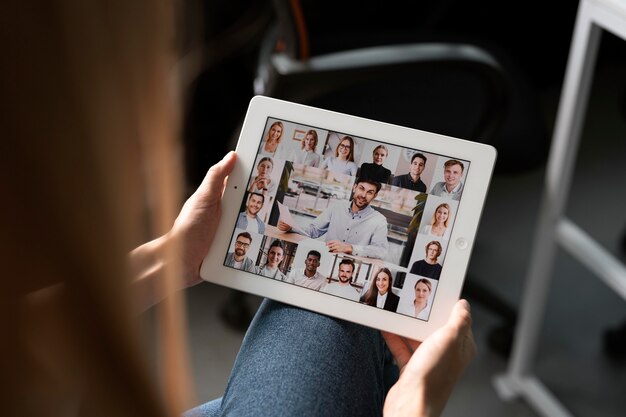 Employee holding tablet close up