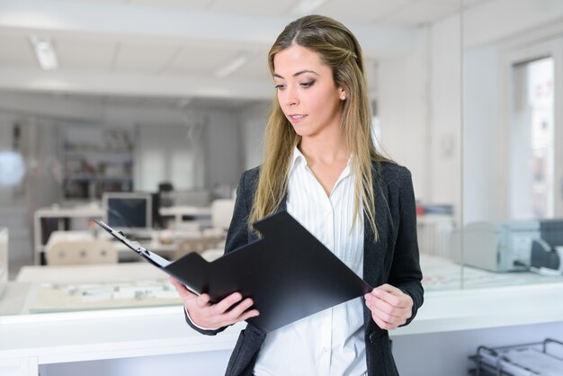 Employee reading a report